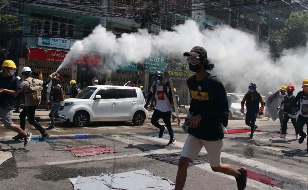 Myanmar protesters trapped in late-night standoff as military tries to silence independent media