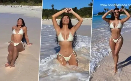 Kim Kardashian Soaks the Sun in a White Bikini As She Enjoys a Day by the Beach (View Pics)