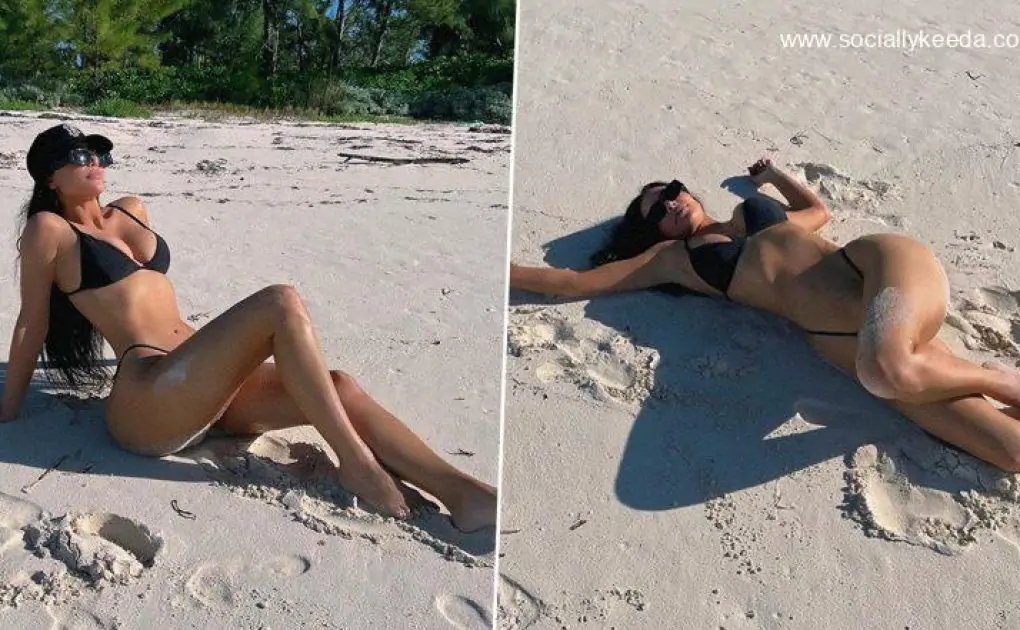 Kim Kardashian Is a Bombshell in Black Bikini As She Plays Around in the Sun and Sand (View Pics)