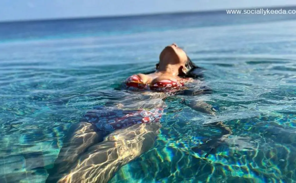 Malavika Mohanan Floats Like A Mermaid In A Red Bikini, Shares A Sexy Snap From Her Maldives Vacay!
