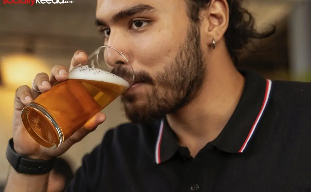 man drinking beer