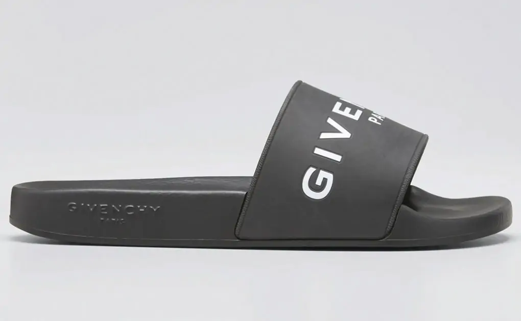 Rebel Wilson Hits the Beach in Plunging Bathing Suit & Designer Slides – Footwear News