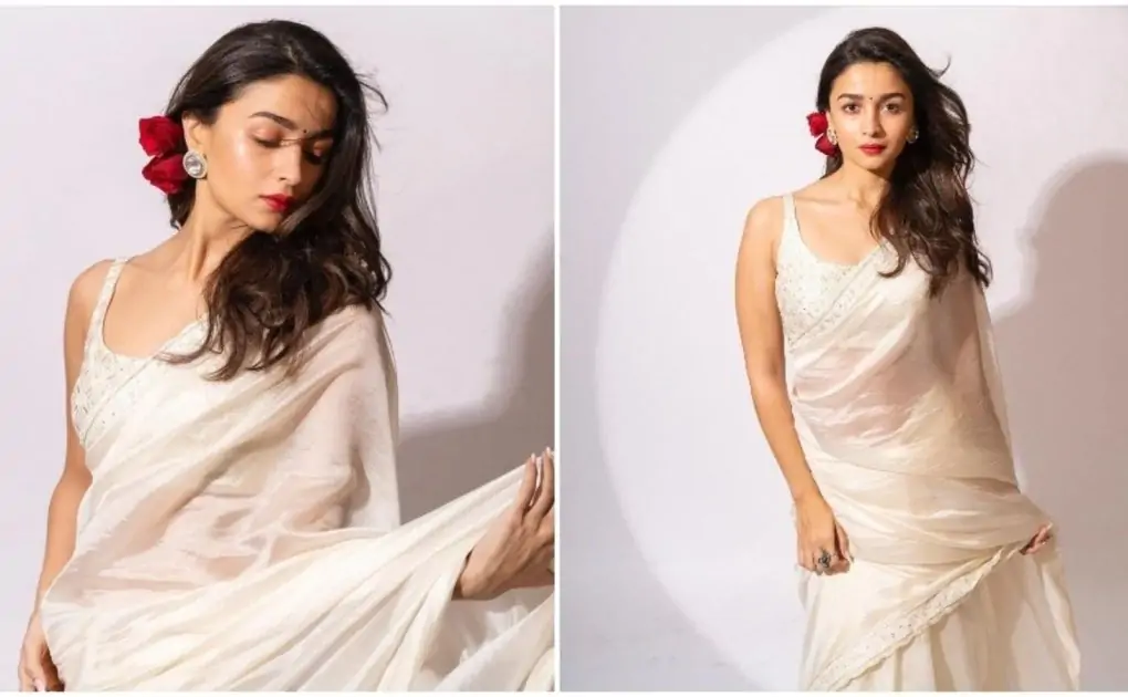 Alia Bhatt promotes film Gangubai Kathiawadi the vintage way with organza saree, red rose
| Hindustan Times