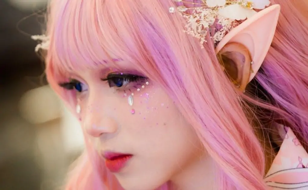 woman wearing elf ear and floral headdress