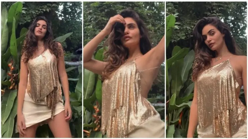 Gabriella Demetriades makes head turn in strappy backless top and short skirt