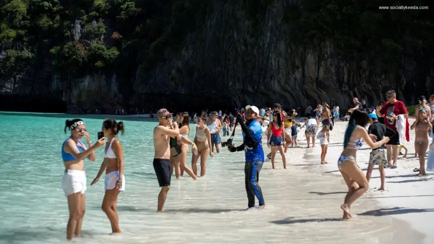 Tourists visit Maya Bay as Thailand reopens world-famous beach after closing it for more than 3 years