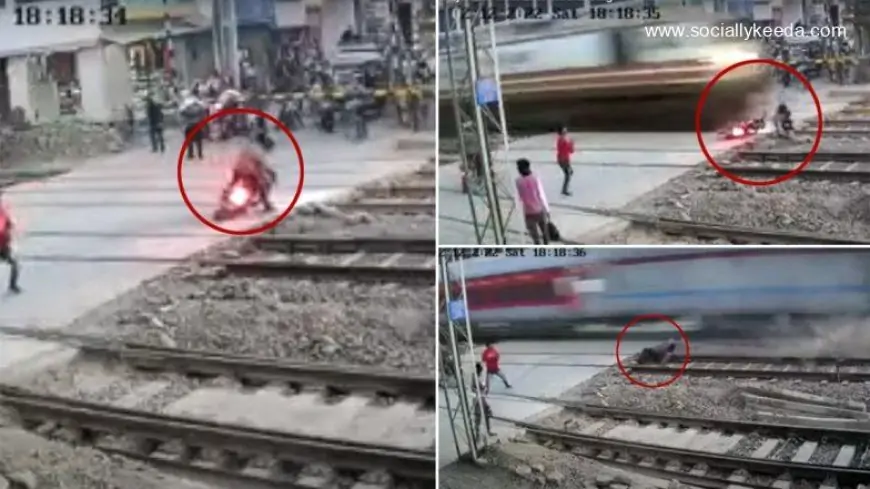 Biker Narrowly Escapes a Close-Call As Speeding Train Shatters His Bike (Watch Video)