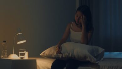 beautiful asian young woman sitting bed take sleeping pill night medicine bedroom unhealthy sick indian female suffers from insomnia headache depressed girl holds antidepressant meds 7861 2142 - scoaillykeeda.com