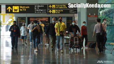 People In Masks At Changi Airport 21 - Scoaillykeeda.com