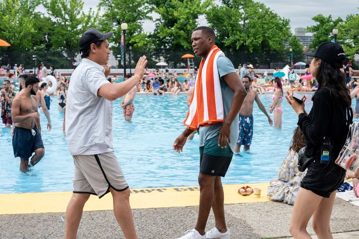 Director Jon M. Chu on set with Hawkins.