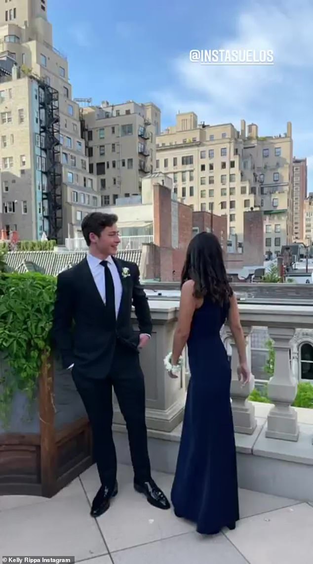 Monumental moment: There were also images of Joaquin and Melissa posing for photos outside with high-rise apartment buildings in the backdrop