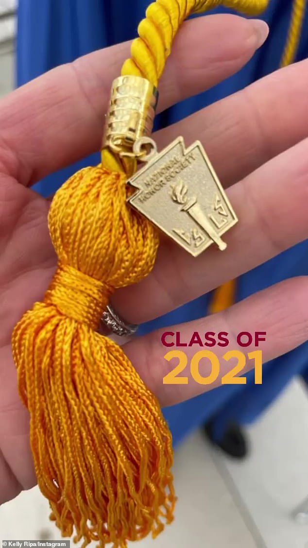 Honor student: She also included a close-up of his tasseled gold honor cord with a charm that read 'National Honor Society'