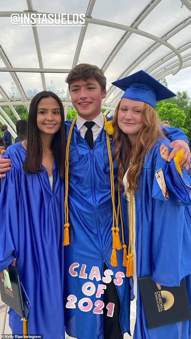 Grads: Joaquin posed for photos with his prom date Melissa and a female friend