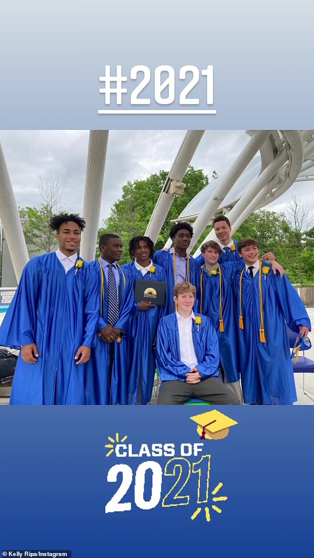 All together: In one group shot, the teenager smile with a group of his fellow Class of 2021 pals