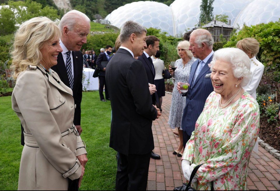 The Queen beamed as she met the couple at the G7