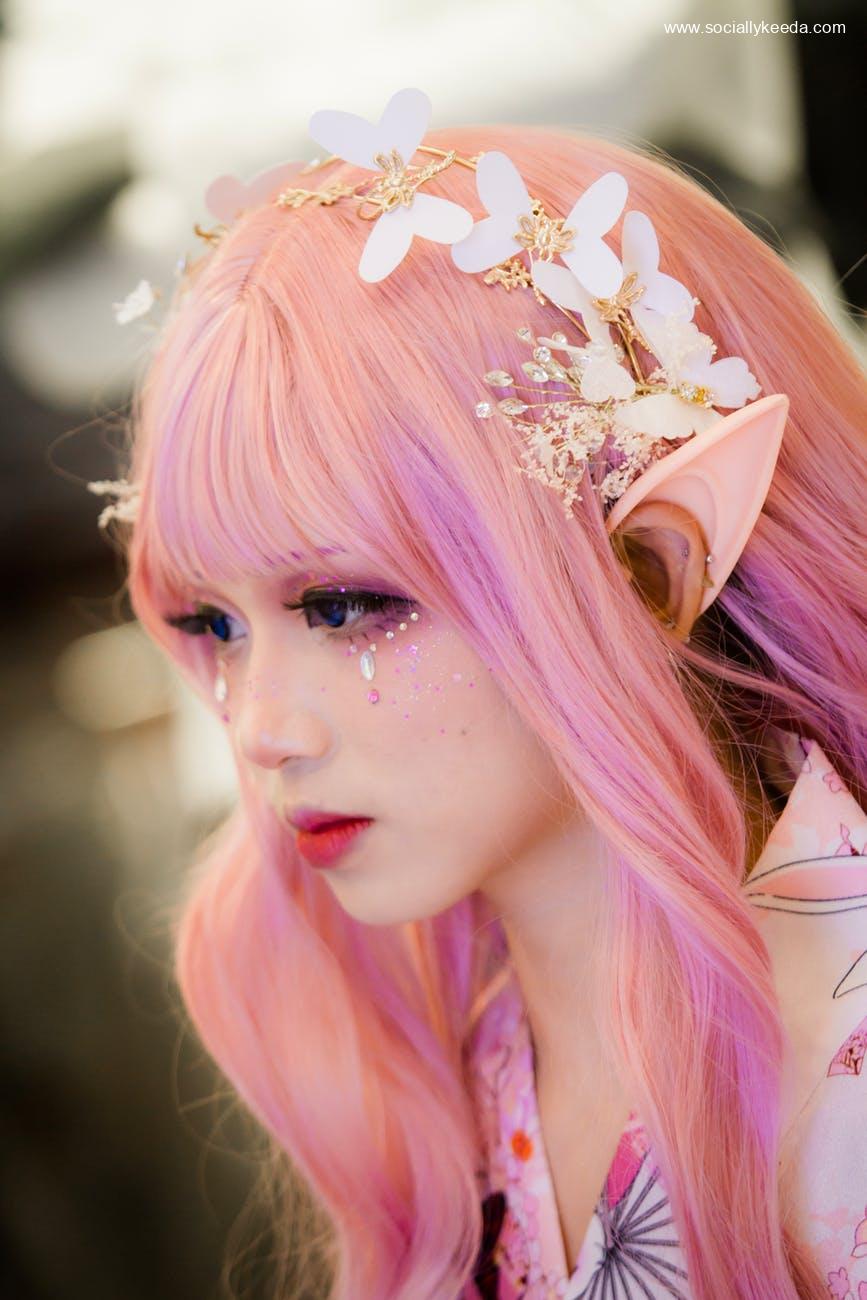 pexels photo 2034541 - sociallykeeda Woman Wearing Elf Ear And Floral Headdress
